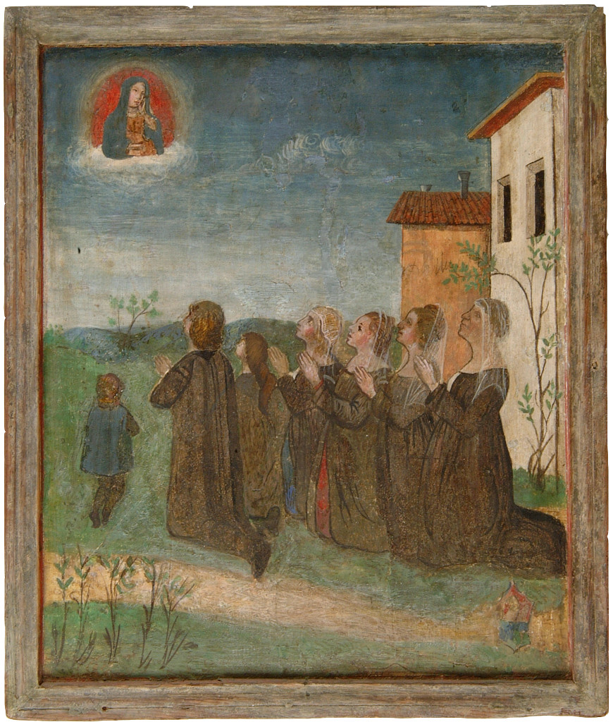 Family kneel in prayer in front of their house preview image